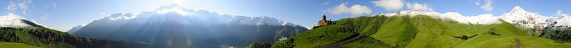 Snow-capped peak of Mount Kazbek at sunset — 3