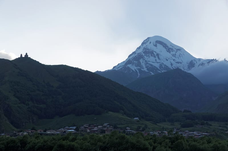 Snow-capped peak of Mount Kazbek at sunset — 2